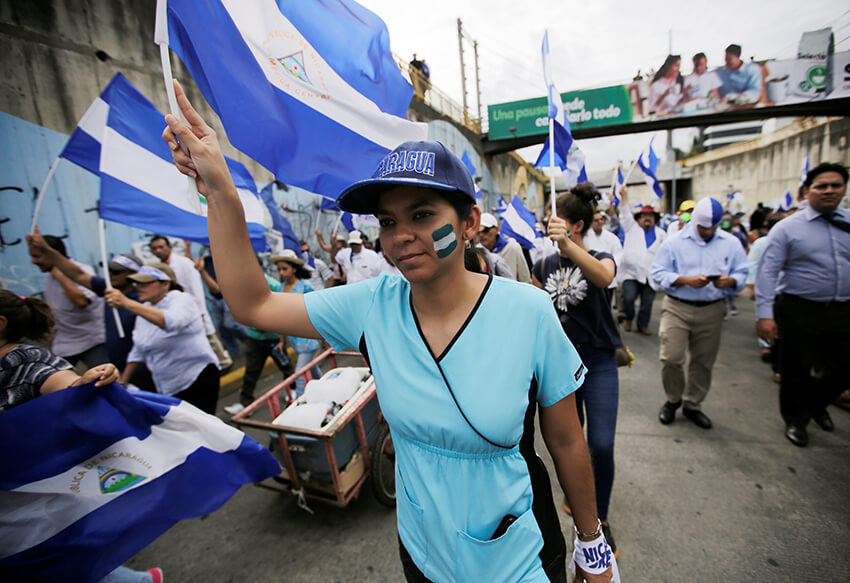 Manifestantes en una marcha antigubernamental